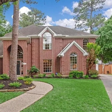 Buy this 4 bed house on 8667 Asprey Court in Champion Forest, TX 77379