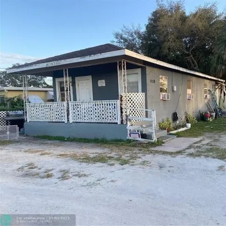 Buy this 4 bed house on 900 North 10th Street in Fort Pierce, FL 34950