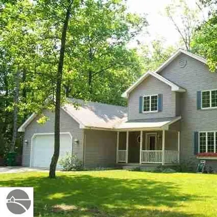 Buy this 3 bed house on 5598 Supply Road in East Bay Township, MI 49696