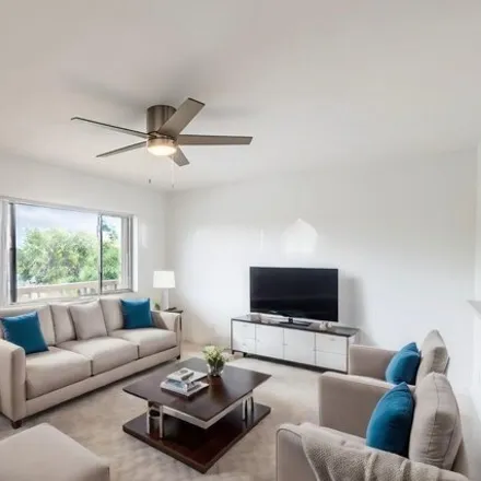 Rent this 1 bed condo on 100 Village Green Circle East in Palm Springs, FL 33461