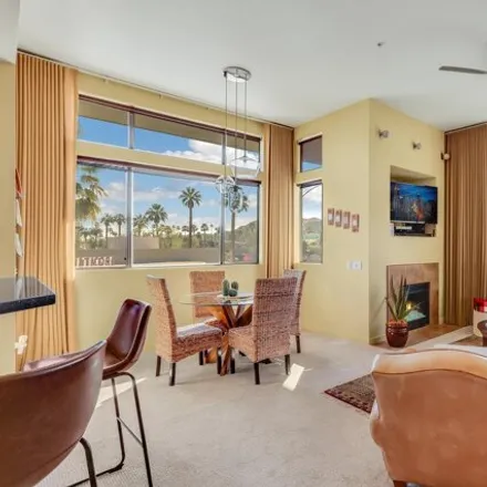 Buy this 2 bed condo on King's Highway in 701 East Palm Canyon Drive, Palm Springs