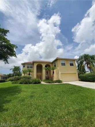 Rent this 5 bed loft on 2200 Colefax Court in Lehigh Acres, FL 33973