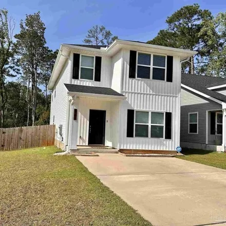Rent this 4 bed house on unnamed road in Ferry Pass, FL 31514