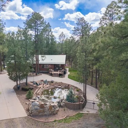 Buy this 4 bed house on 676 Lone Wolf Lane in Lake of the Woods, Navajo County