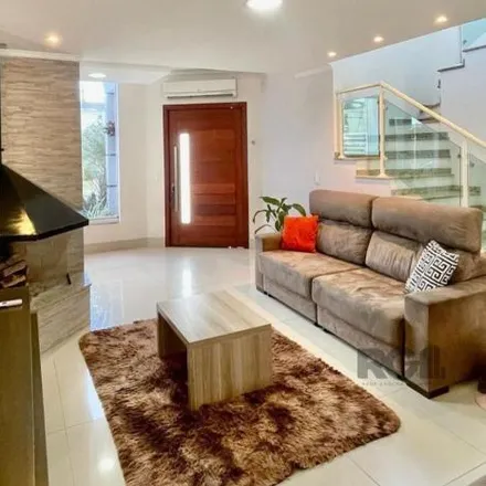Buy this 4 bed house on Rua Antonietta Barone in Mário Quintana, Porto Alegre - RS
