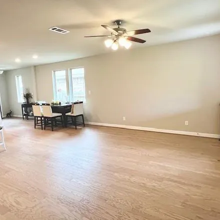 Rent this 3 bed apartment on Rowan Green Drive in Harris County, TX 77346