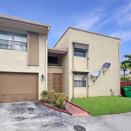 Buy this 2 bed house on 8403 North Missionwood Circle in Miramar, FL 33025