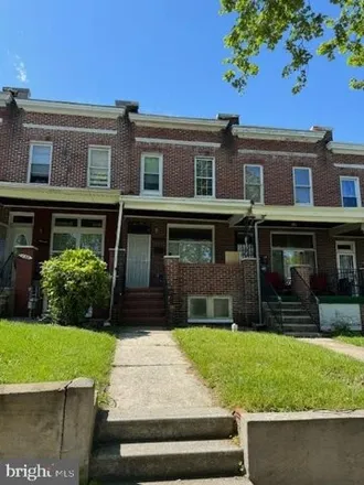 Rent this 4 bed townhouse on 130 South Culver Street in Baltimore, MD 21229