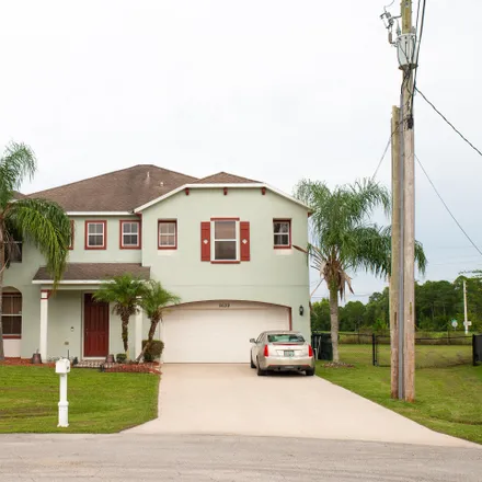 Buy this 4 bed house on 5639 Northwest Bluff Court in Port Saint Lucie, FL 34986