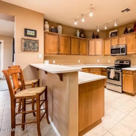 Buy this 3 bed apartment on 19475 North Grayhawk Drive in Scottsdale, AZ 85255