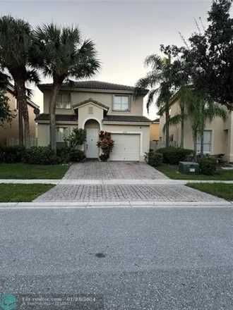 Buy this 4 bed house on 4354 Lake Tahoe Circle in West Palm Beach, FL 33409
