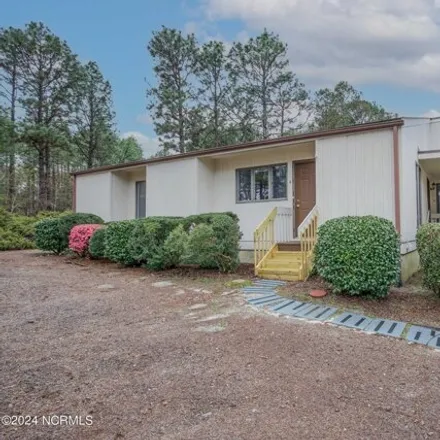 Rent this 2 bed condo on 36 Martin Drive in Whispering Pines, Moore County