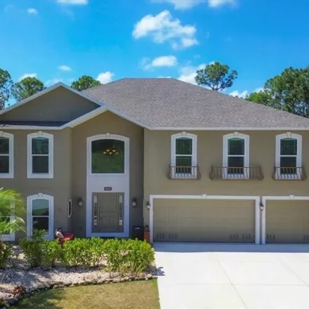 Buy this 5 bed house on 14113 Banos Avenue in Charlotte County, FL 33981