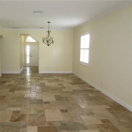 Rent this 4 bed house on 13623 Troia Dr in Estero, Florida