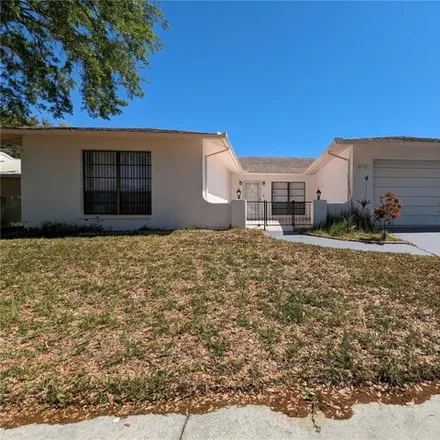 Rent this 3 bed house on 8726 Aruba Lane in Jasmine Estates, FL 34668