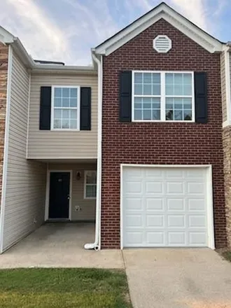 Rent this 3 bed townhouse on 33 Middlebrook Drive in Atco, GA 30120