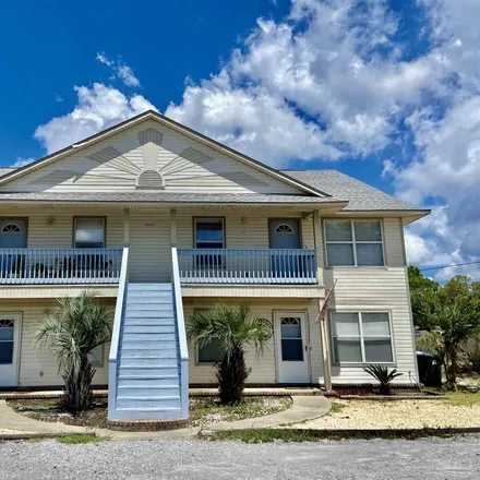 Rent this 2 bed townhouse on 13848 River Road in Gulf Beach Heights, Escambia County