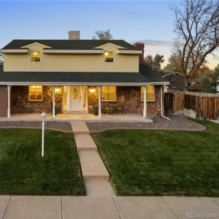 Buy this 4 bed house on 5819 West Milan Place in Denver, CO 80235