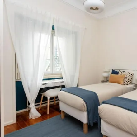 Rent this 7 bed room on Rua Augusto Machado 204 in 1900-999 Lisbon, Portugal