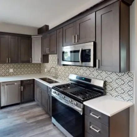 Buy this 7 bed apartment on 2200 North Kenneth Avenue in Hanson Park, Chicago
