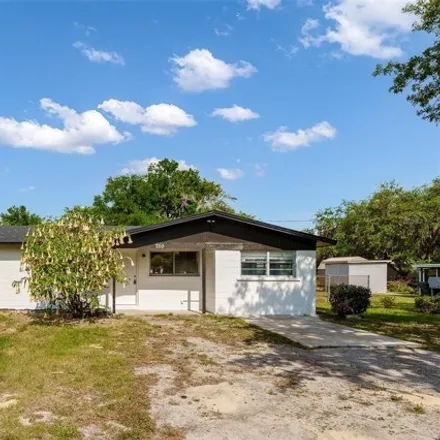 Buy this 4 bed house on 744 Grove Drive in Polk County, FL 33830