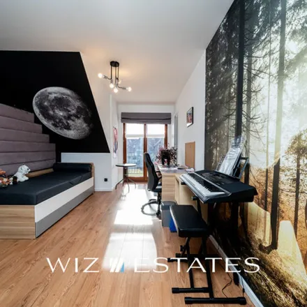 Rent this 7 bed apartment on Leona Petrażyckiego 154A in 30-399 Krakow, Poland