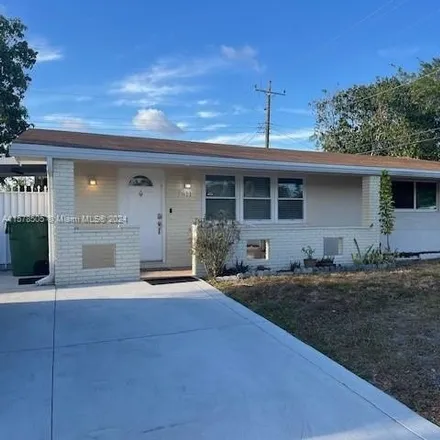 Buy this 3 bed house on 7617 Northwest 15th Court in Pembroke Pines, FL 33024