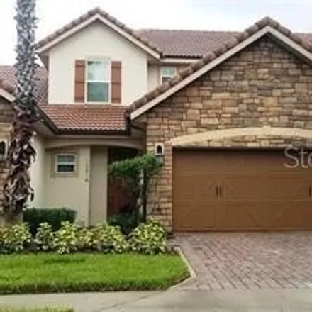 Rent this 4 bed townhouse on 10408 Belfry Circle in Orange County, FL 32832