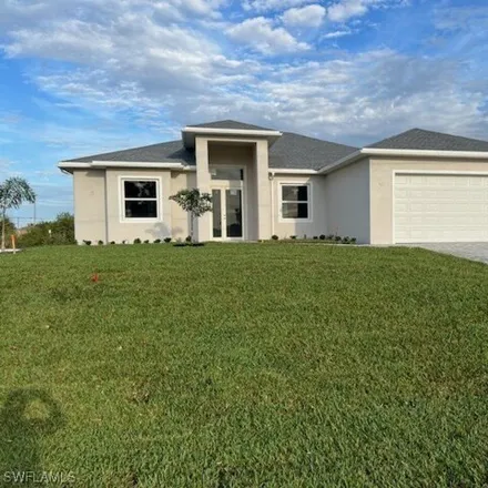 Buy this 3 bed house on 1099 Northwest 3rd Place in Cape Coral, FL 33993