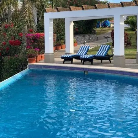 Rent this 4 bed house on El Cid Golf & Coustry Club in Del Campeador, Zona Dorada