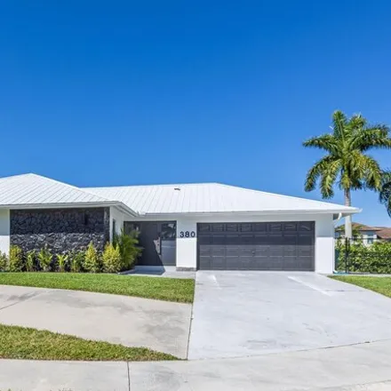 Buy this 4 bed house on Rookery Court in Marco Island, FL