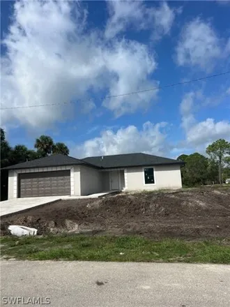 Buy this 3 bed house on 1234 West 17th Street in Lehigh Acres, FL 33972