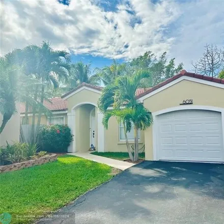 Rent this 3 bed house on 6199 Northwest 44th Lane in Coconut Creek, FL 33073