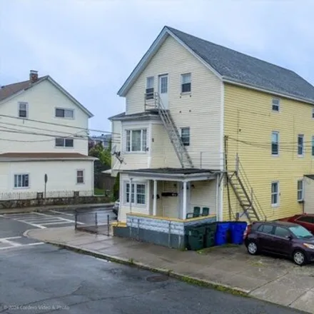 Buy this 9 bed house on 68 Aetna St in Fall River, Massachusetts