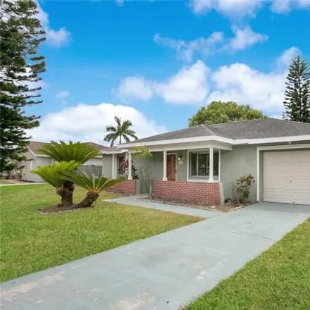 Rent this 2 bed house on 12866 Montana Woods Lane in Meadow Woods, Orange County