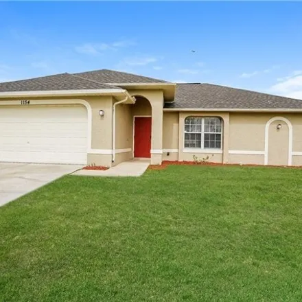 Rent this 3 bed house on 1236 Northwest 27th Avenue in Cape Coral, FL 33993