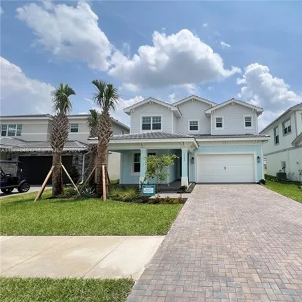 Rent this 4 bed house on 17190 Tawny Owl Trl Unit 17190 in Loxahatchee, Florida