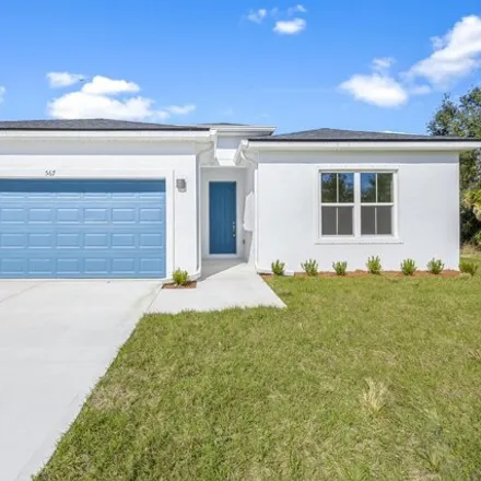 Buy this 4 bed house on 565 Hansare Street Southwest in Palm Bay, FL 32908