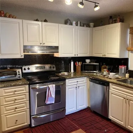 Buy this 3 bed condo on unnamed road in Coral Springs, FL 33071
