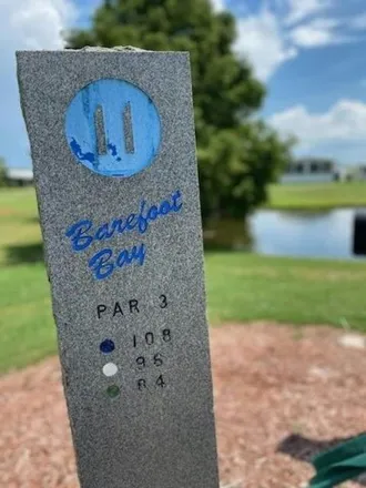 Buy this studio apartment on Barefoot Bay Golf Course in 1225 Barefoot Boulevard, Brevard County