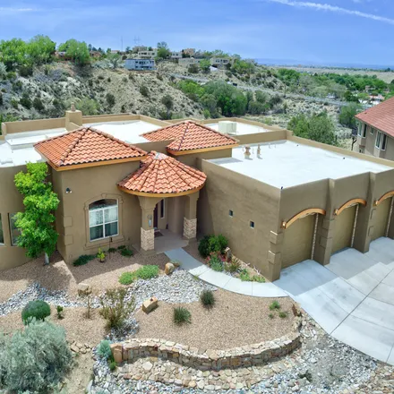 Buy this 4 bed house on 451 Poinsettia Place Southeast in Winterwood Park (HOA), Albuquerque