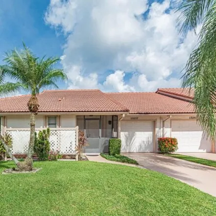 Rent this 2 bed house on Eastpointe Country Club in Briarlake Drive, Palm Beach County