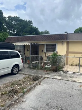 Buy this 4 bed house on 3940 NW 207th Street Rd in Miami Gardens, Florida