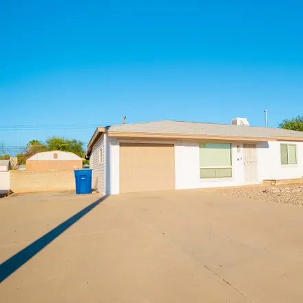 Rent this 3 bed house on 1107 South Duquesne Drive in Tucson, AZ 85710
