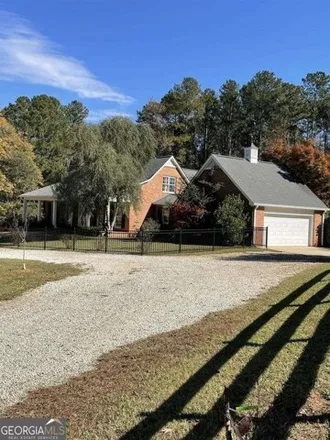 Rent this 4 bed house on Sandy Creek Road in Fayetteville, GA 30214