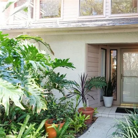Buy this 2 bed townhouse on 1980 Whispering Way in Tarpon Springs, FL 34689