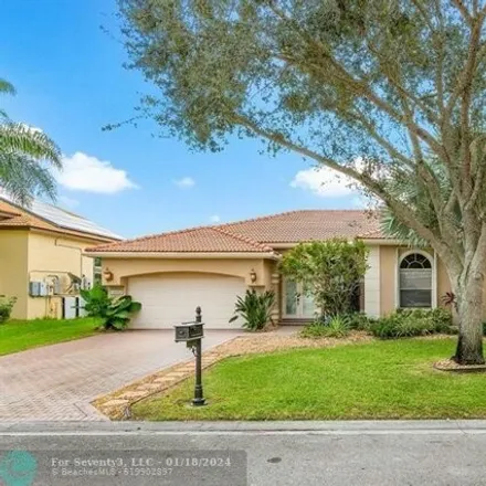 Buy this 4 bed house on 10302 Nw 54th Pl in Coral Springs, Florida