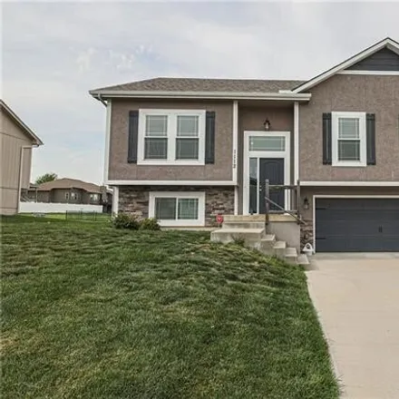 Buy this 4 bed house on 1148 Southwest 10th Terrace in Oak Grove, MO 64075