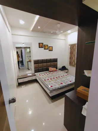 Rent this 2 bed apartment on NIRMA University in SG Highway, Gota