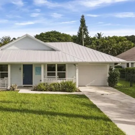 Rent this 3 bed house on 9153 Southeast Athena Street in Hobe Sound, Martin County